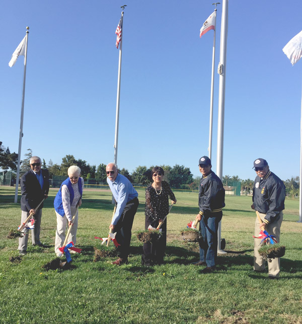 group of members from District 2 with shovels at the groundbreaking event