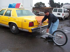 Picture of inspector checking a taxi.